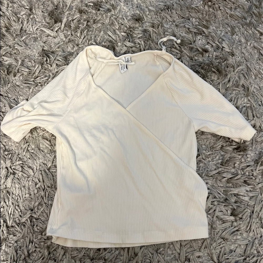 Other stories wrap tee